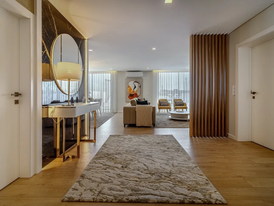 Fotografia do Hall de Entrada com a sala de estar